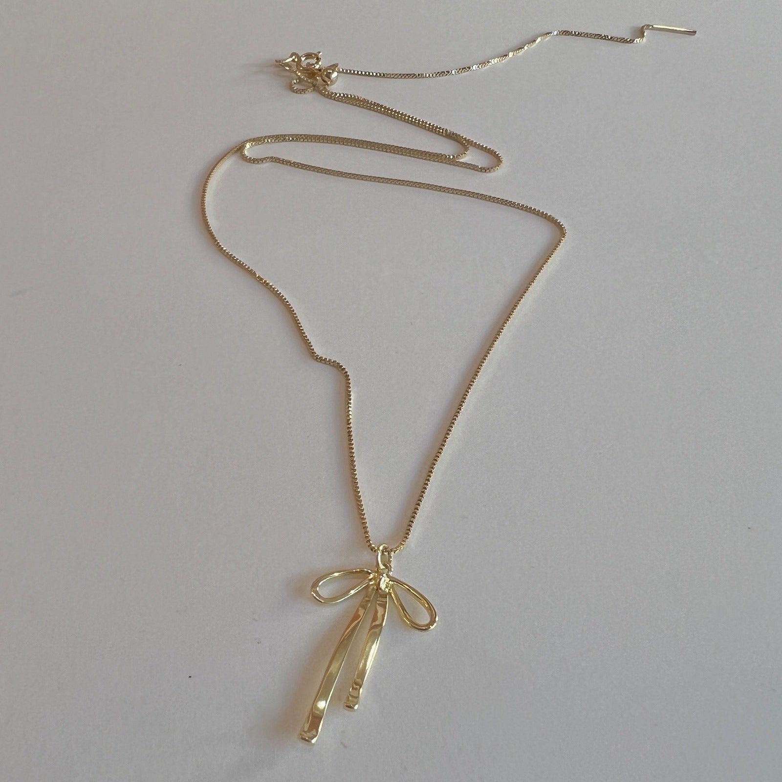 Louise Bow Necklace - Gold or Silver Necklaces