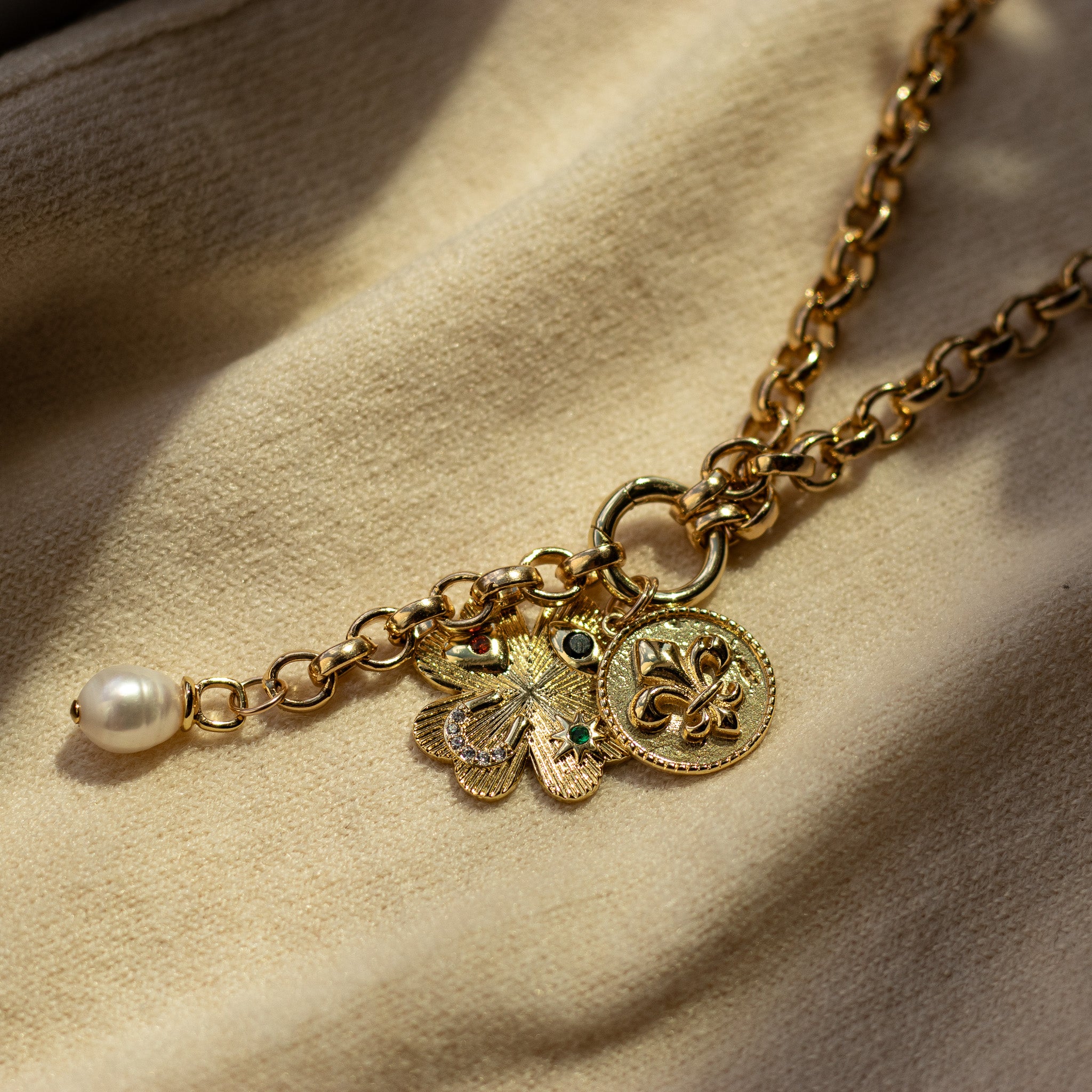 Lys Charm Drop Necklaces