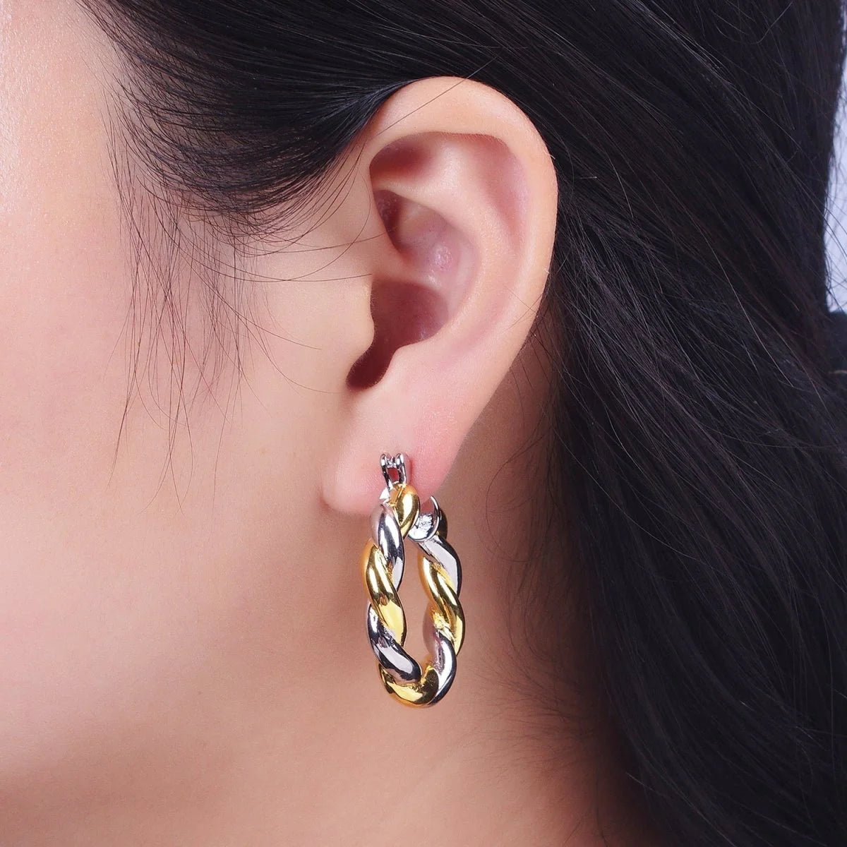 twisted mixed metal hoops Earrings